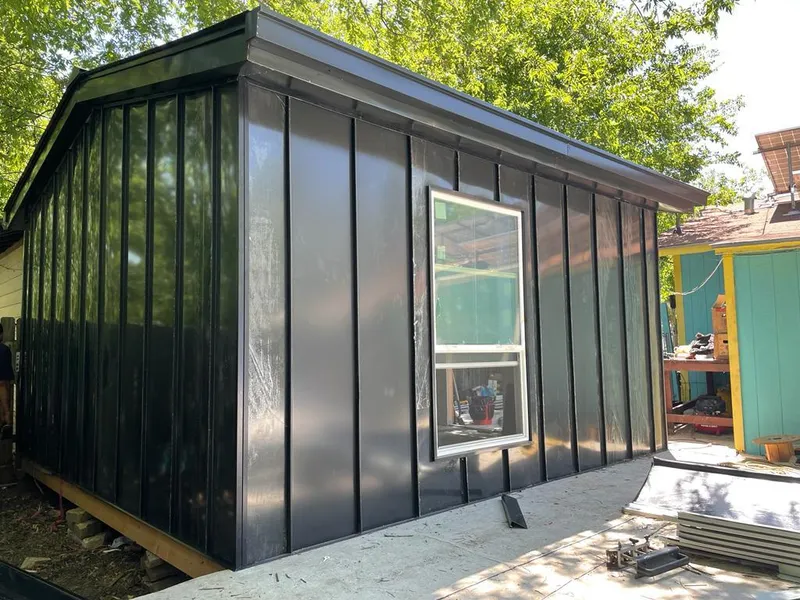 Black standing seam metal wall panels for Metal Roof Installation in Viera West